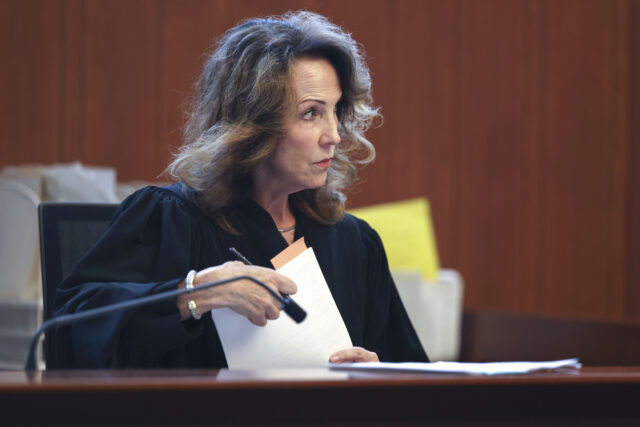 Public Defenders Pay Dispute The Associated Press