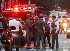 Four dead, including NYPD officer, in New York skyscraper shooting