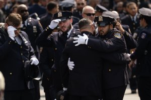 Slain NYPD officer Islam promoted to detective during funeral