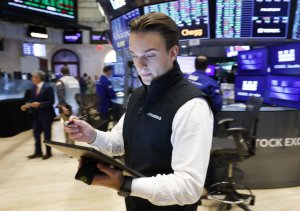 S&P, Nasdaq hit record highs amid optimistic earnings