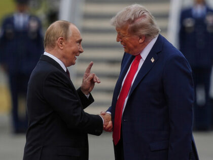 Title: APTOPIX Trump Putin Image ID: 25227723560720 Article: President Donald Trump greets