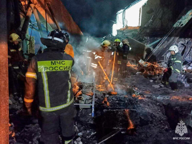 In this photo, released by the Russian Emergency Ministry Press Service on Saturday, Aug.