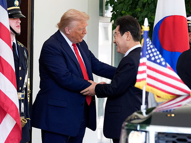 Title: Trump US South Korea Image ID: 25237601728379 Article: President Donald Trump, left