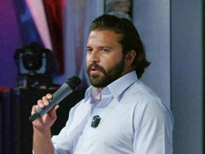 Congressional candidate Brandon Herrera appeals to voters during a campaign rally in San A