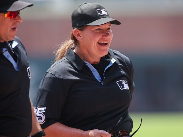 Brett Davis_Getty Images ATLANTA, GEORGIA - AUGUST 9: Umpire Jen Pawol #95 on the field before a game between the A