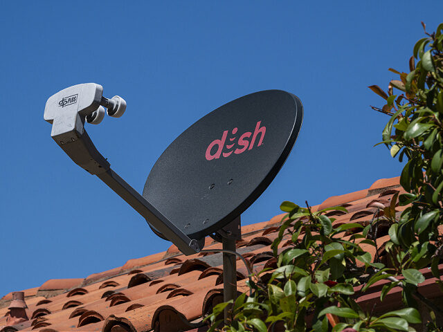 A Dish Network satellite dish on the roof of a home in Crockett, California, US, on Monday