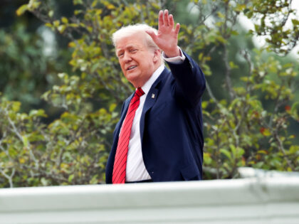 President Donald Trump on the roof of the West Wing of the White House in Washington, DC,
