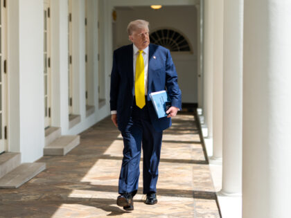 President Donald Trump walks on the West Colonnade to the Oval Office, Monday, July 21, 20