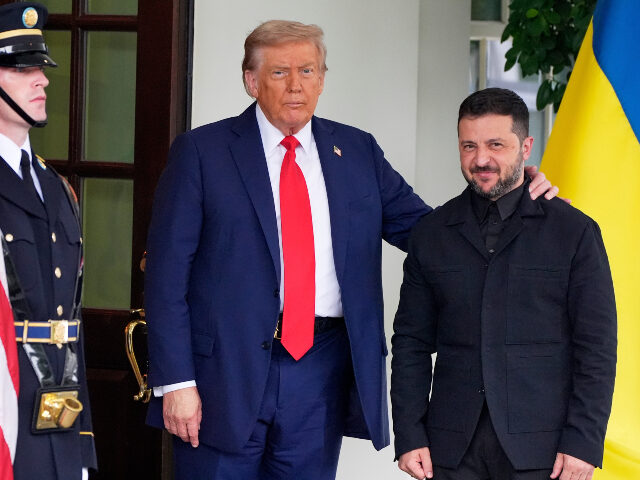 President Donald Trump, left, greets Ukraine's President Volodymyr Zelenskyy as he ar