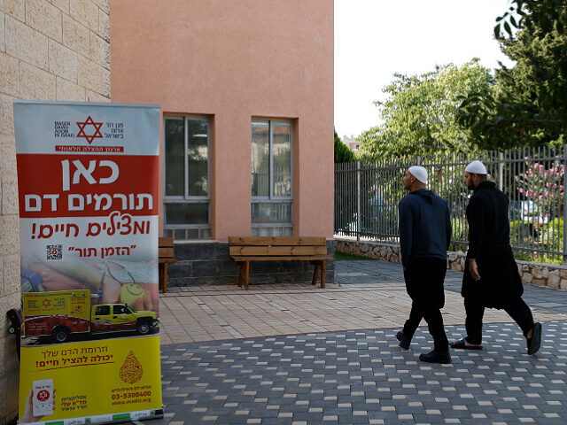 Druze residents of the Israel-annexed Golan Hights participate in a blood drive in Masaada