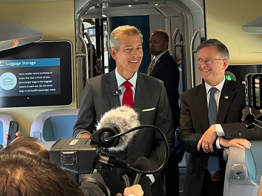 Duffy and Bradbury speak to reporters during the next-gen Acela’s maiden voyage to New York City. Credit: Nick Gilbertson
