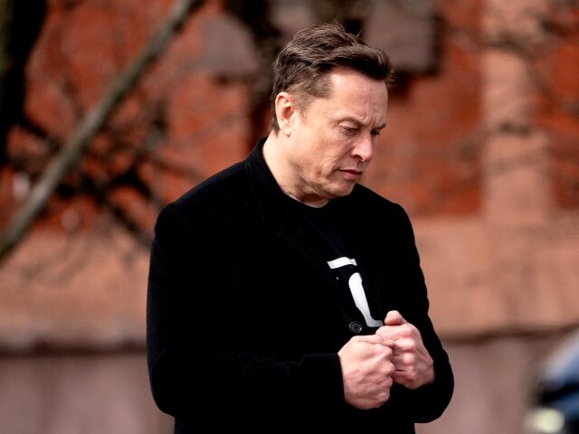 Elon Musk with a pensive look on his face