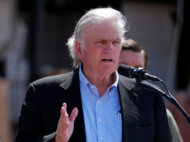 Franklin Graham Republican presidential nominee former President Donald Trump listens as Rev. Franklin Gra