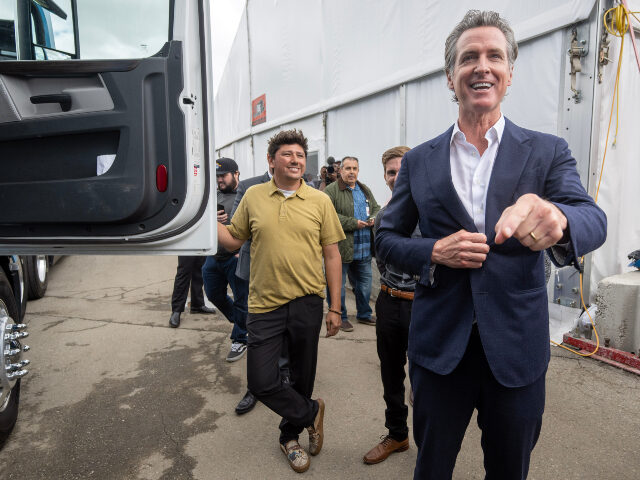 Gavin Newsom California Governor Gavin Newsom looks at alternative fuel trucks at World Energy Paramoun