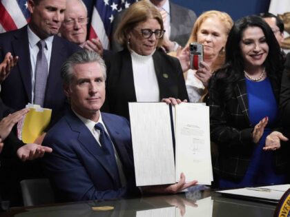 California Gov. Gavin Newsom signs legislation calling for a special election on a redrawn