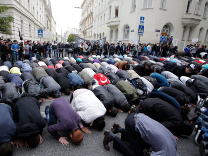 Muslims pray during a protest in front of the US embassy on September 22, 2012 in Vienna.