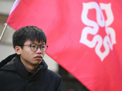 Political activist Tony Chung attends a demonstration outside the Foreign and Commonwealth