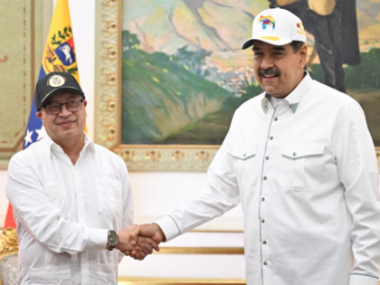 Colombian President Gustavo Petro (L) shakes hands with his Venezuelan counterpart Nicolas