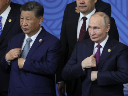 Russian President Vladimir Putin, Chinese President Xi Jinping and other participants in t