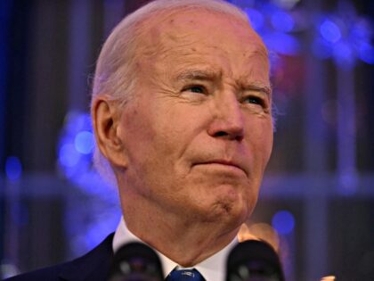 US President Joe Biden speaks during a Hanukkah holiday reception in the East Room of the