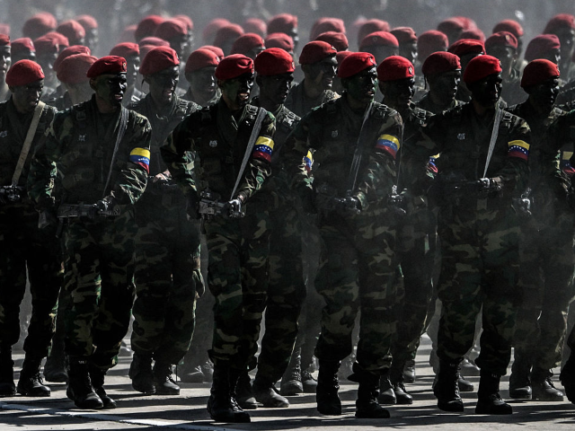 Venezuelan Army members march during a military parade within celebrations for the Indepen