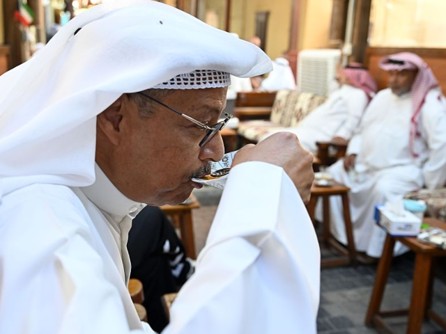 People enjoy tea at Dalalwa Cafe in Kuwait City, Kuwait, July 7, 2025. Located in the old