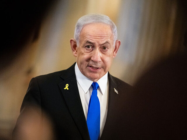 Benjamin Netanyahu, Israel's prime minister, speaks to members of the media following