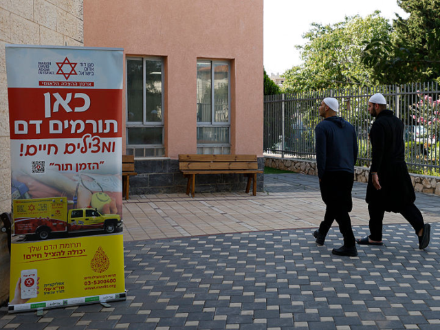 Druze residents of the Israel-annexed Golan Hights participate in a blood drive in Masaada