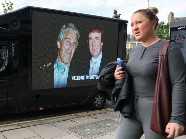 GettyImages-2227343873 ABERDEEN, SCOTLAND - JULY 28: A van showing an image of Jeffrey Epstien with Donald Trump