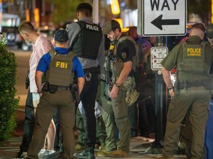 D.C. - WASHINGTON, DC - AUGUST 10: FBI and Border Patrol officers arrest a man, after he a