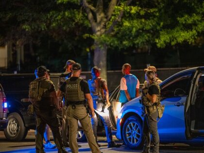 WASHINGTON, DC - AUGUST 12: Department of Homeland Security (DHS) and U.S. marshal personn