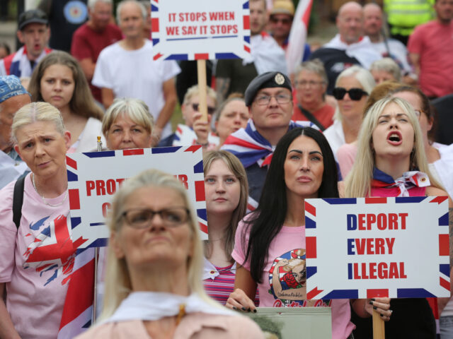 NORWICH, ENGLAND - AUGUST 17: Protesters including some military veterans protest outside