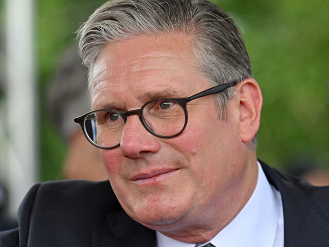 King Charles III And Queen Camilla Commemorate The 80th Anniversary Of VJ Day ALREWAS, STAFFORDSHIRE - AUGUST 15: Britain's Prime Minister Keir Starmer attends a S