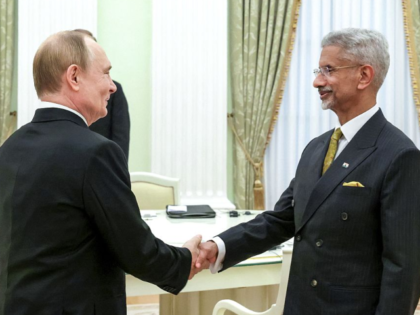 In this pool photograph distributed by the Russian state agency Sputnik, Russia's Presiden