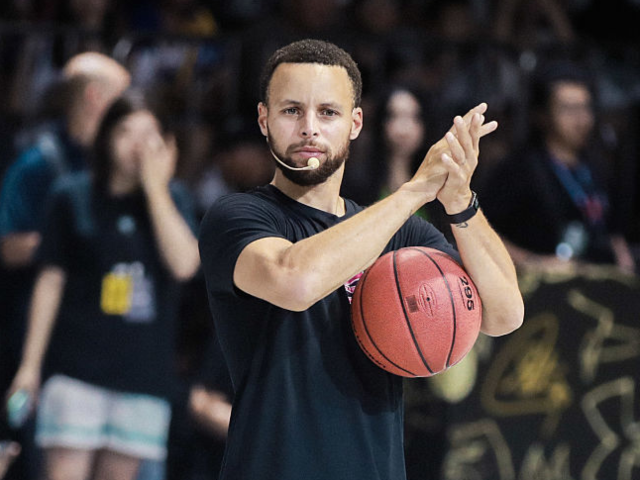 CHONGQING, CHINA - AUGUST 18: NBA superstar Stephen Curry interacts with fans during his C