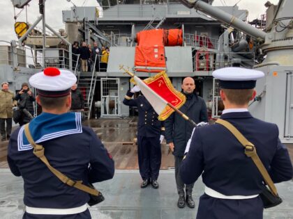 France's Minister for Europe and Foreign Affairs Jean-Noel Barrot stands to attention in f