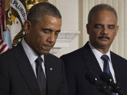US President Barack Obama (L) and US Attorney General Eric Holder (R) announce Holder's re