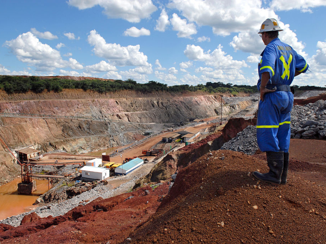 GettyImages-94902670 ZAMBIA - FEBRUARY 07: A mine supervisor overlooks Metorox's Chibuluma copper mine, near Ki