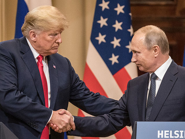 GettyImages1000209288 U.S. President Donald Trump (L) and Russian President Vladimir Putin shake hands during a