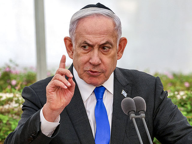Israeli Prime Minister Benjamin Netanyahu speaks during a state memorial ceremony for the