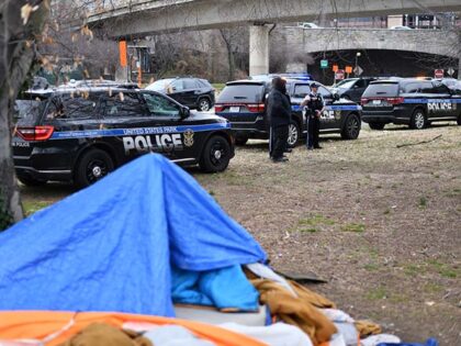 Auchincloss - National Park Police monitors an area where of an homeless encampment that D