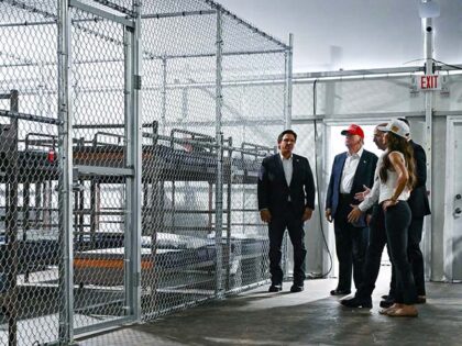 US President President Donald Trump (2L), Florida Governor Ron DeSantis (L), and Secretary