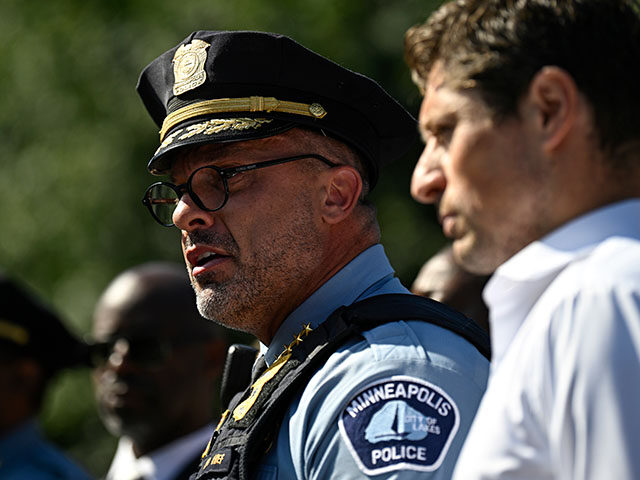 GettyImages2232398157 Minneapolis Police Chief Brian O'Hara (L) speaks as Mayor Jacob Frey looks on during a pre