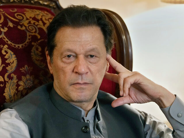 Imran Khan Pakistan's former prime minister Imran Khan listens to a member of media during talk