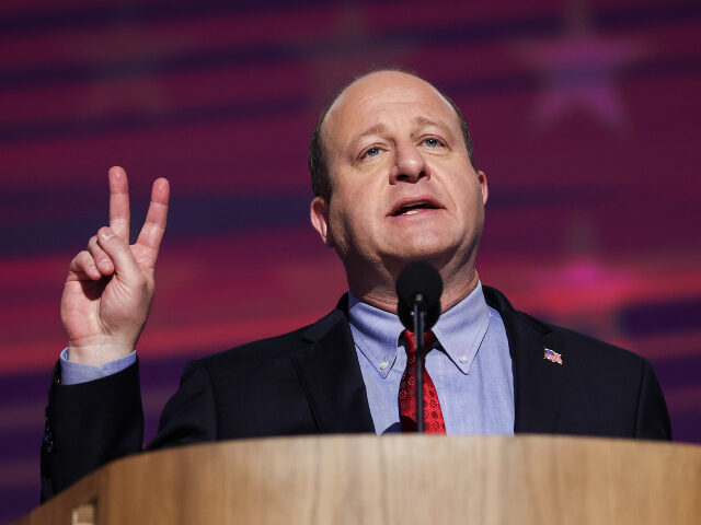 Jared Polis Colorado Gov. Jared Polis speaks on stage during the third day of the Democratic National