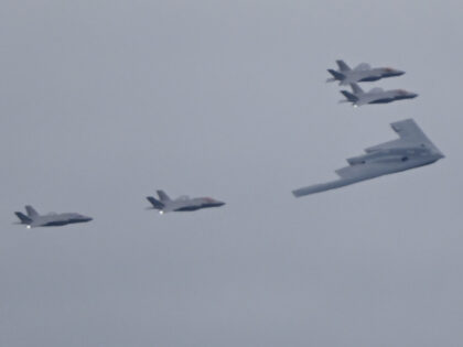 F-35 jets and B-2 Bomber accompany the plane carrying the Russian President Vladimir Putin