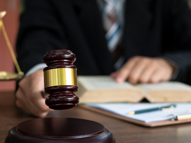 Judge with gavel on table. attorney, court judge,tribunal and justice concept.