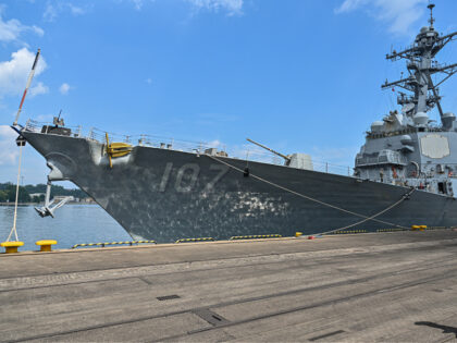 GDYNIA, POLAND - JUNE 07: An US navy soldier walks past the USS Gravely Destroyer Ship moo