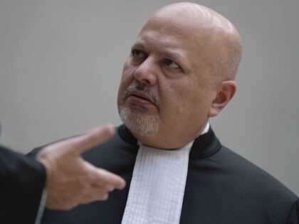 Chief Prosecutor Karim Khan talks while waiting for former Philippine President Rodrigo Du