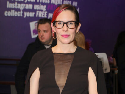 Disney’s ‘Lightyear’ Writer Defends Lesbian Scenes After Snoop Dogg Rails Against